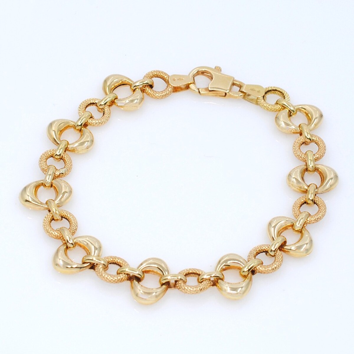 Pulsera en oro 18k con aros lisos y otros labrados 