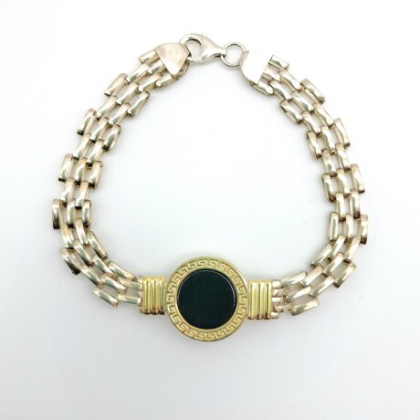 Pulsera de plata 925, double en oro 18 ktes y onix. Pulsera de plata 925, double en oro 18 ktes y onix.