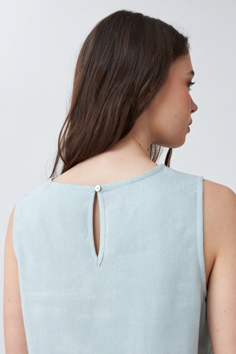 Blusa de lino con efecto desflecado verde agua