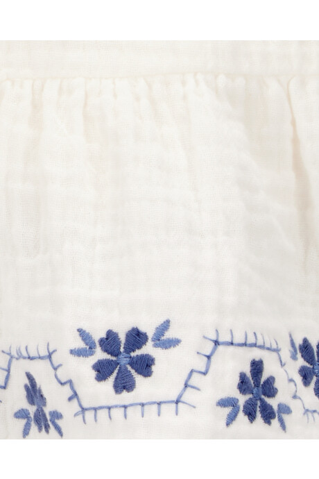 Pollera short de gasa, con bordado floral Pollera short de gasa, con bordado floral