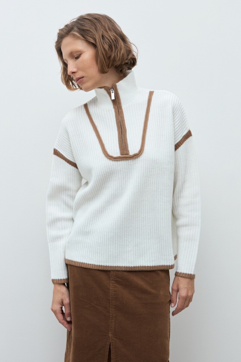 Sweater vivo en contraste crudo