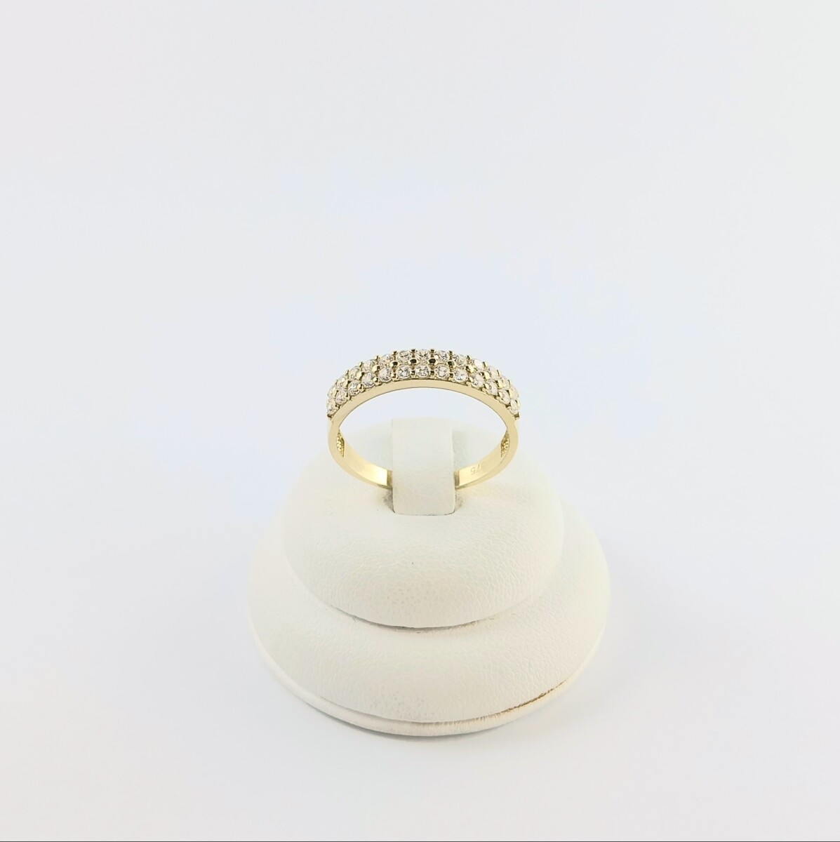 Anillo medio infinito doble con circonias en 4 puntas de oro 9 ktes. 