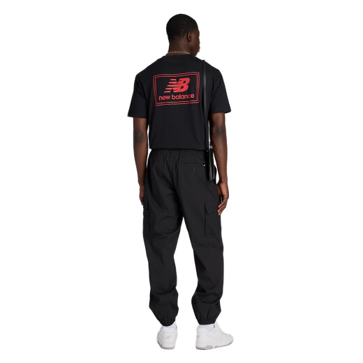 Remera New Balance Woven Label - Negro Remera New Balance Woven Label - Negro