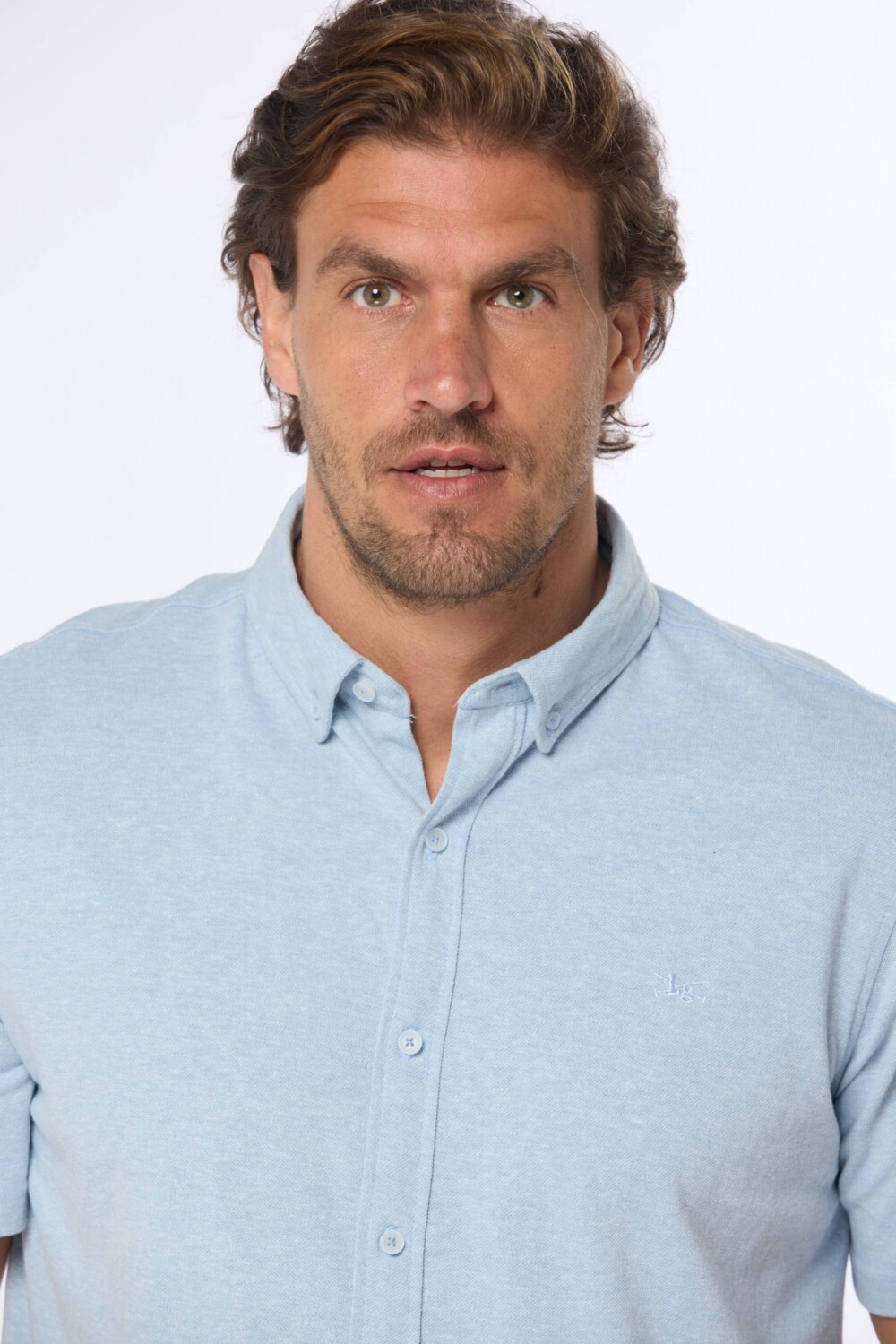 CAMISA LISA EN PIQUE Celeste