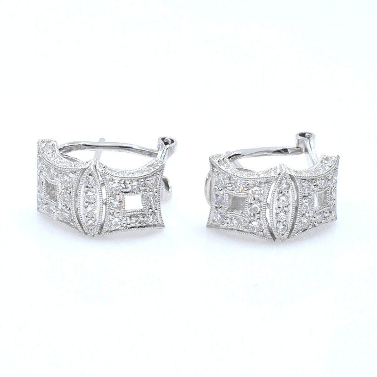 Caravanas clips 18k en oro blanco con brillantes 