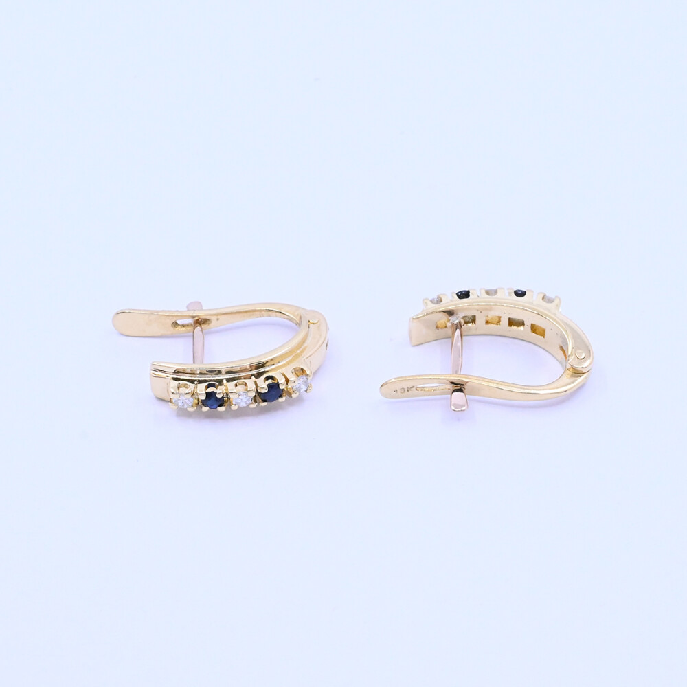 Caravanas oro 18k con brillantes y zafiros. Caravanas oro 18k con brillantes y zafiros.