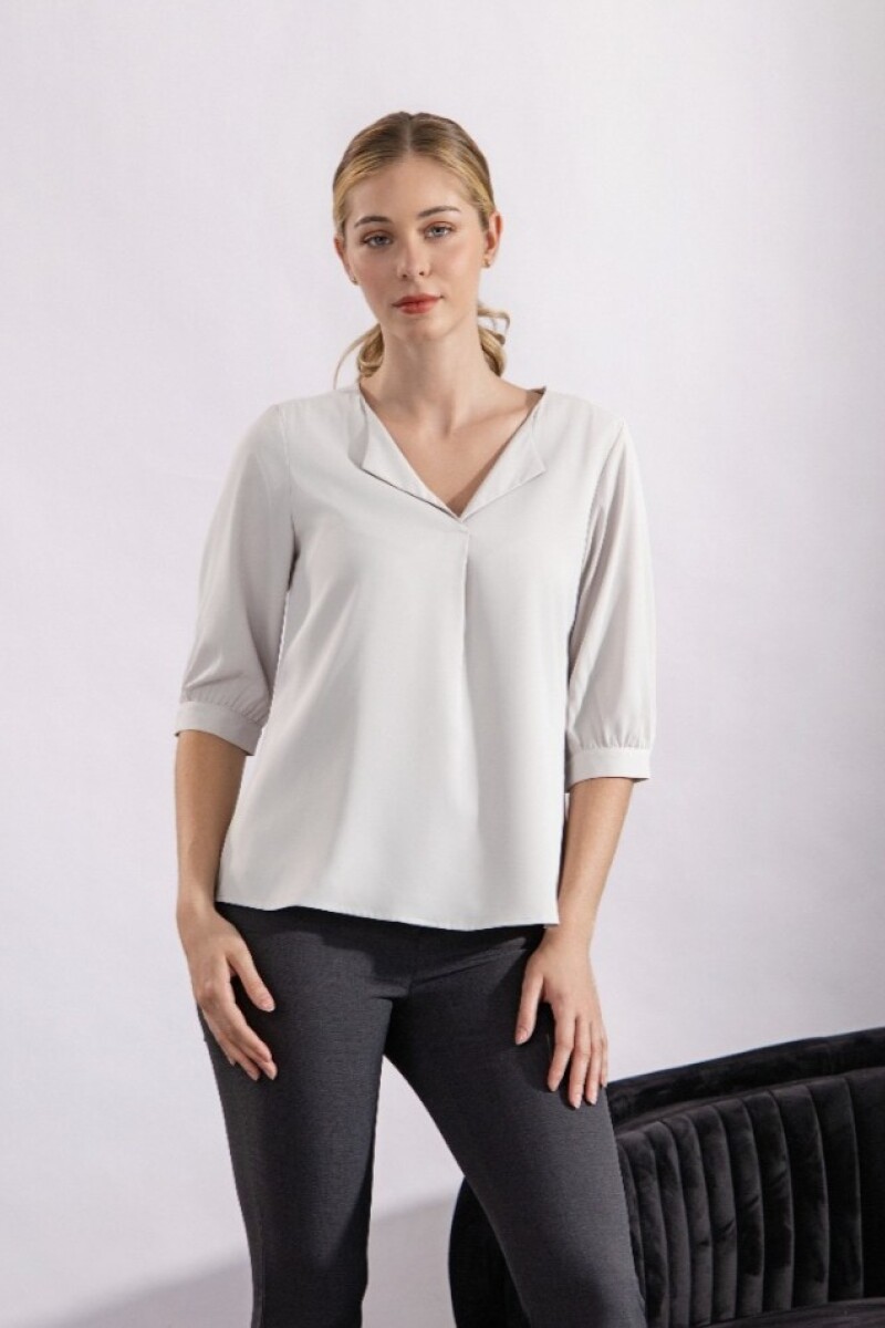 Blusa con Solapa. Blusa con Solapa.