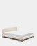 Cama desenfundable Odina bouclé crudo y patas de madera maciza de fresno acabado tono nogal para colchón de 180 x 200 cm