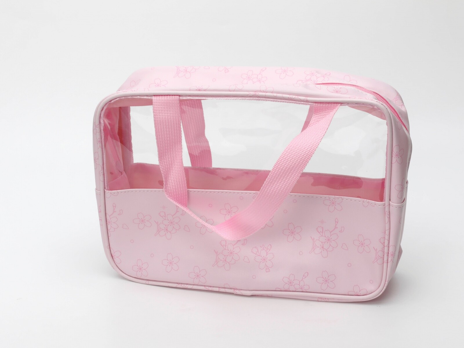 NECESER TRANSPARENTE CON ASAS ESTAMPADO (FLORES DE CEREZO/L) 