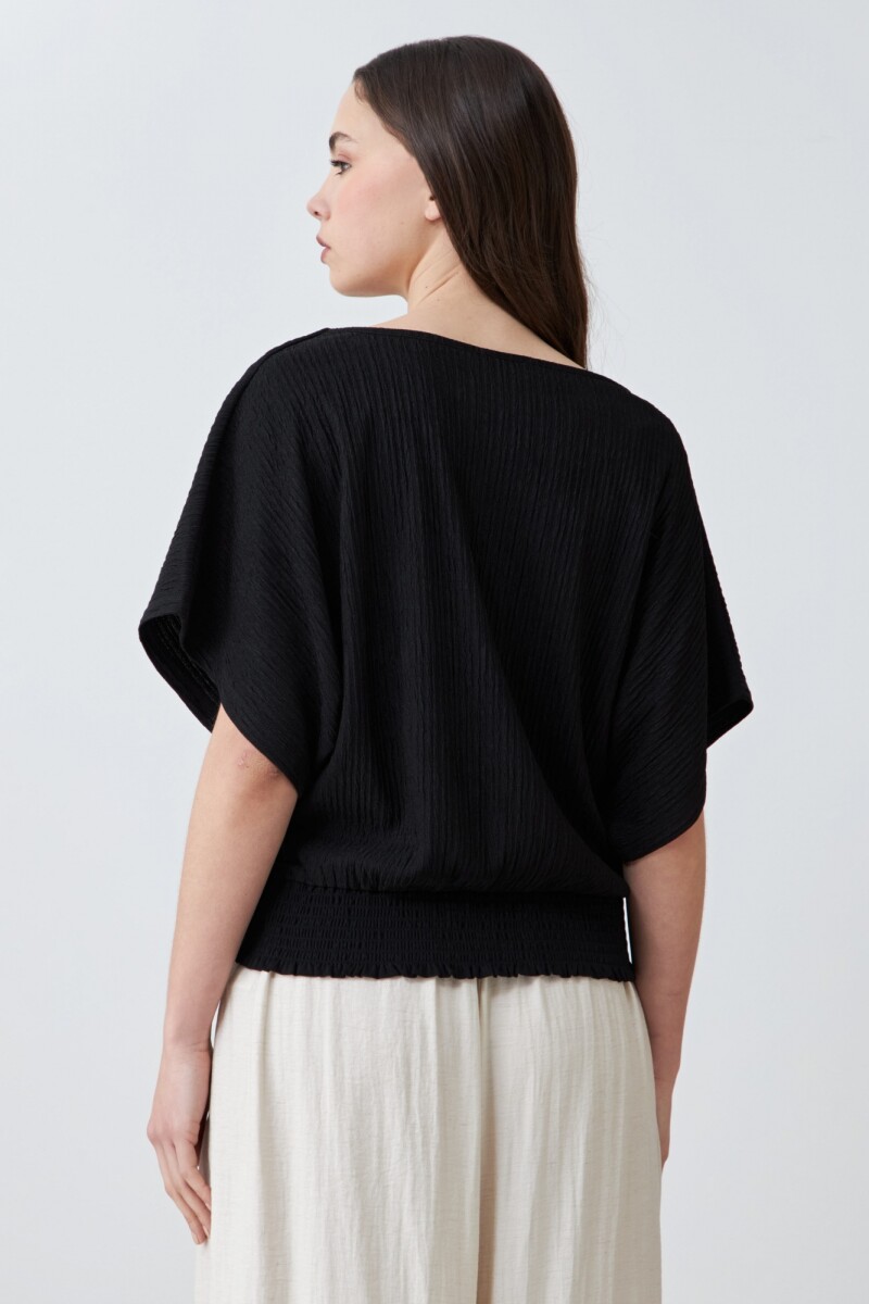 Blusa amasada negro