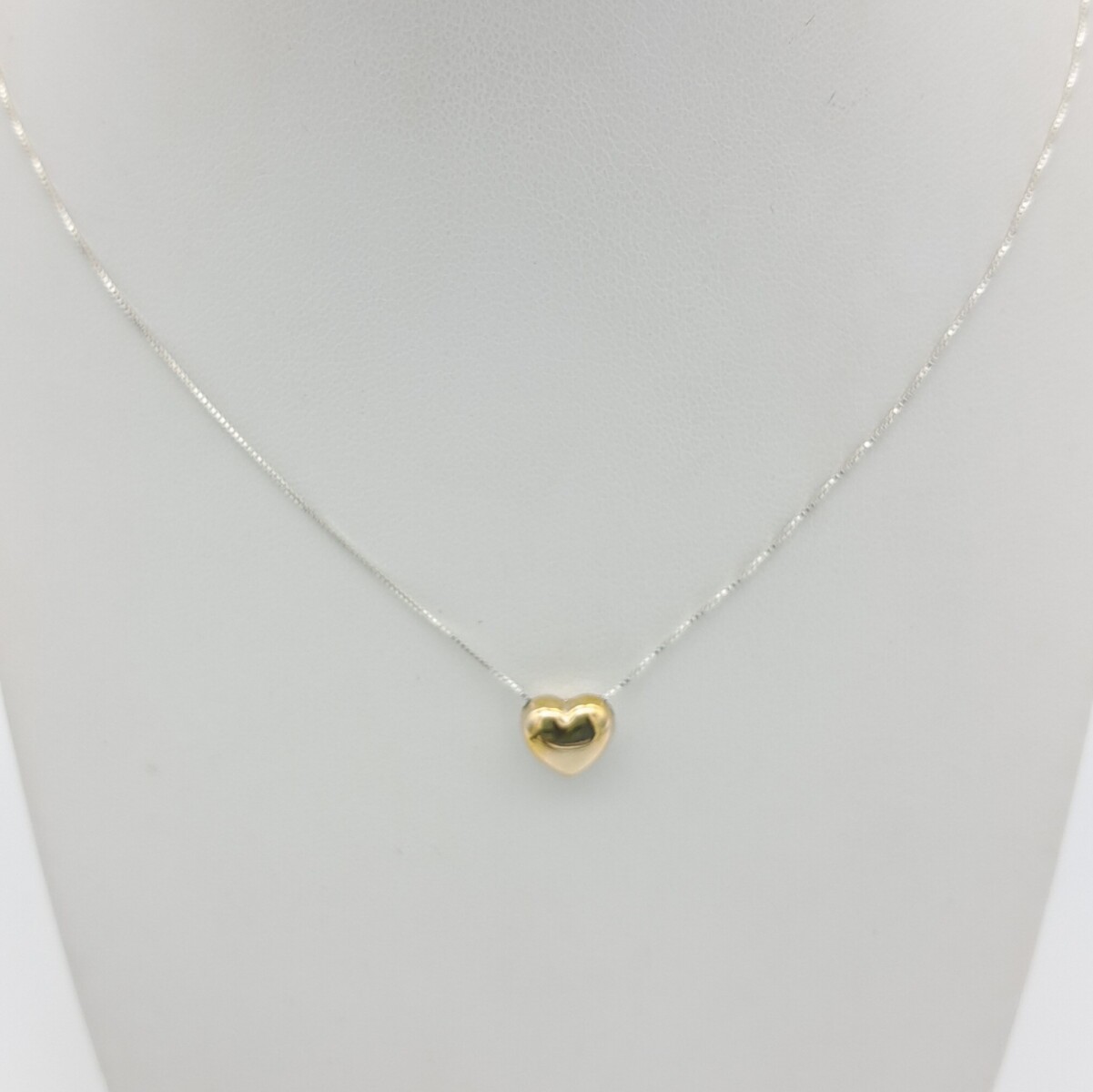 Conjunto de cadena en plata 925 dije pasante en double de oro 18 ktes, CORAZON. 