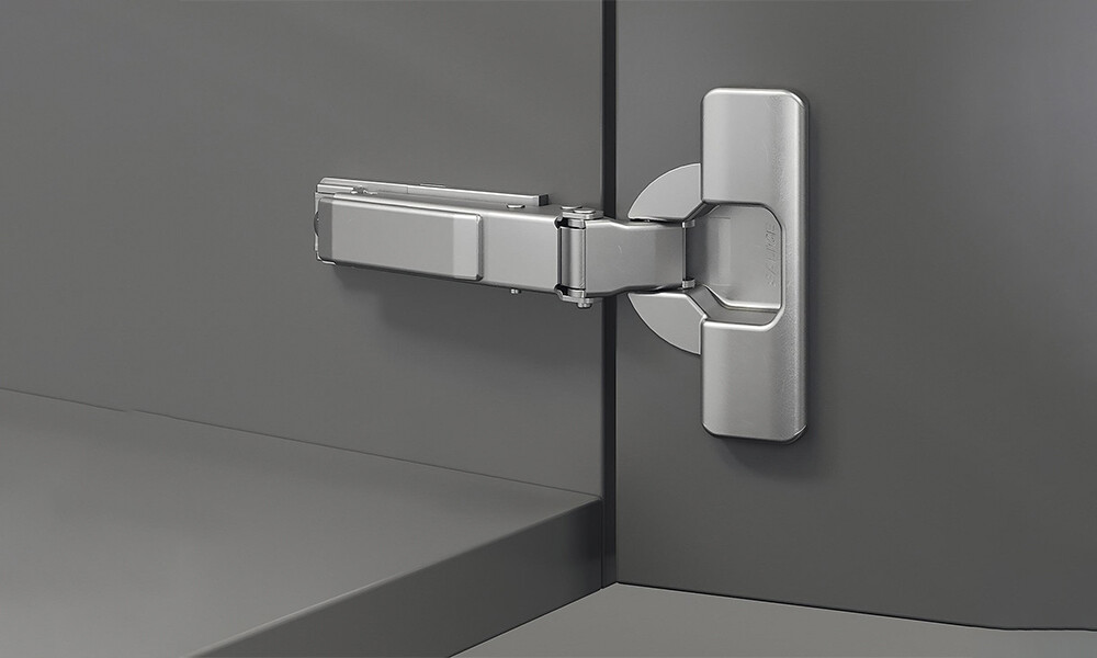 Bisagra push con expulsor integrado 329.17.90 00