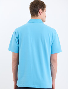 520857 REMERA FERAUD Celeste