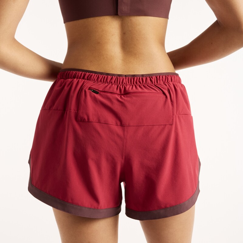 Short Running New Balance de Dama RC Essential WB61J868PDR RED