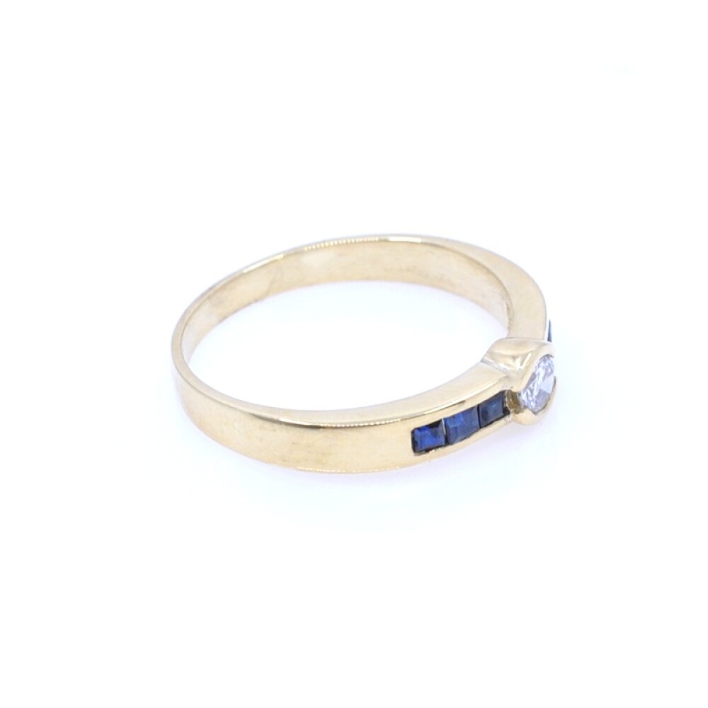 Anillo en oro 18k , brillante y zafiros Anillo en oro 18k , brillante y zafiros