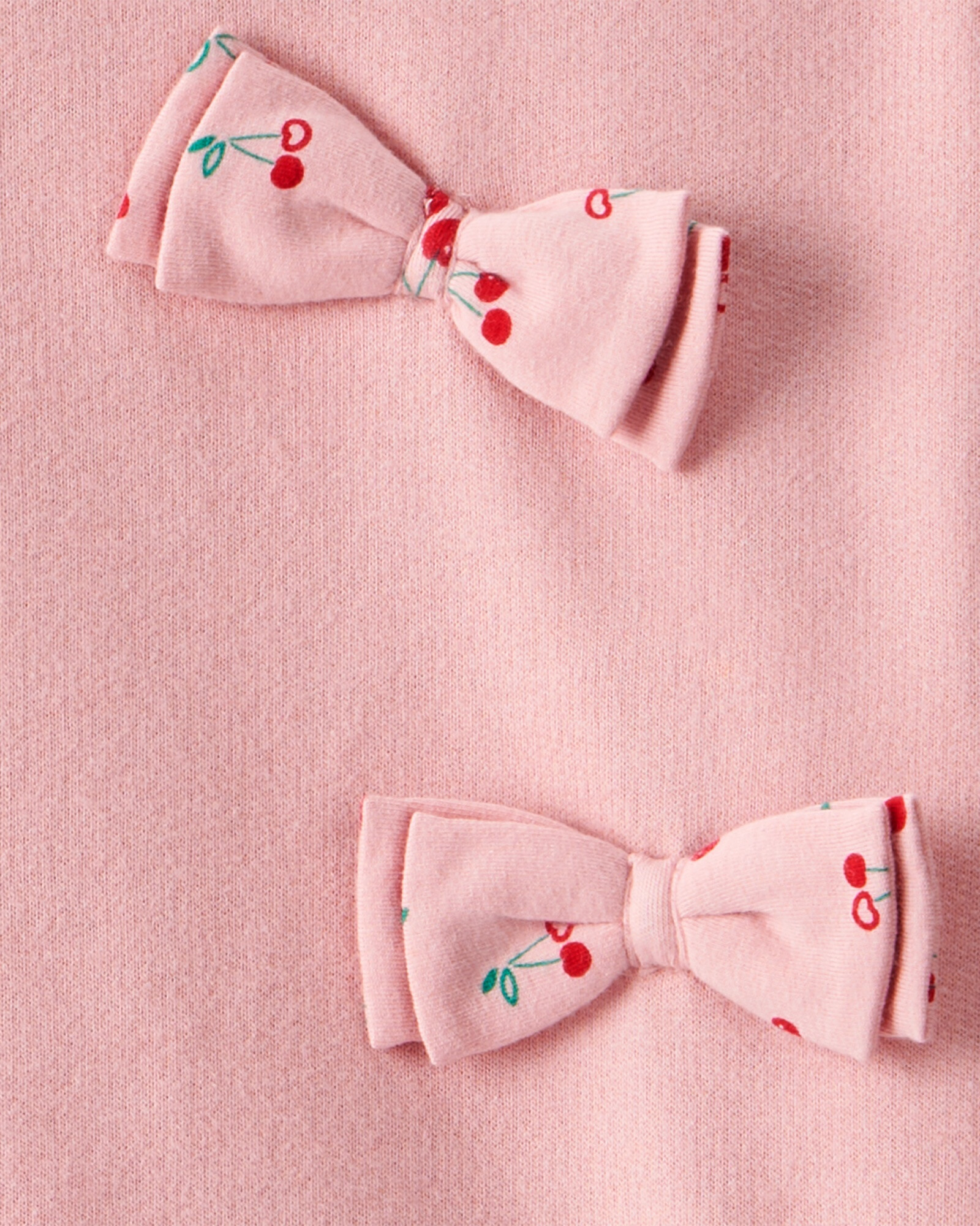Set dos piezas de algodón, pantalón y buzo, rosado, diseño cerezas. Talles 6-24M Sin color