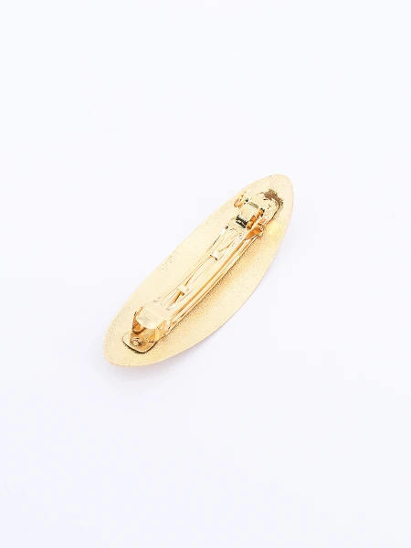 BROCHE DORADO
