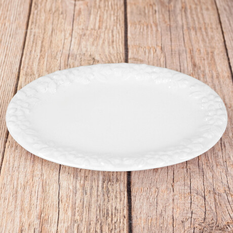 Plato oval de ceramica labrado con flores Plato oval de ceramica labrado con flores