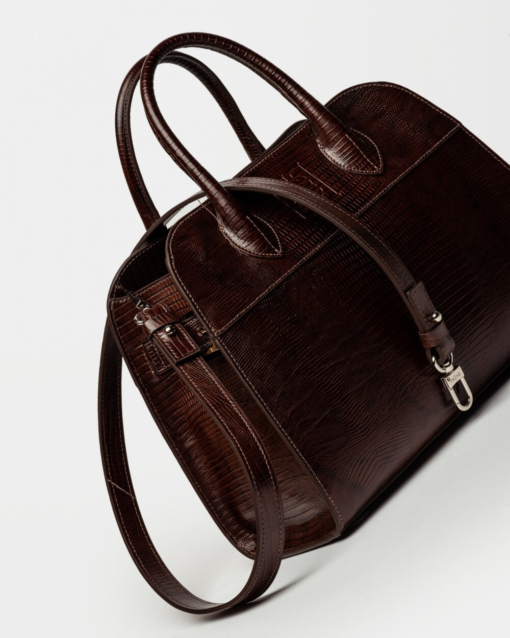 Cartera de Mano The Roots En Cuero Grabado Lagarto Marron