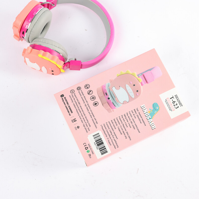 Auriculares bluetooth con vincha diseño dinosaurio rosado Auriculares bluetooth con vincha diseño dinosaurio rosado