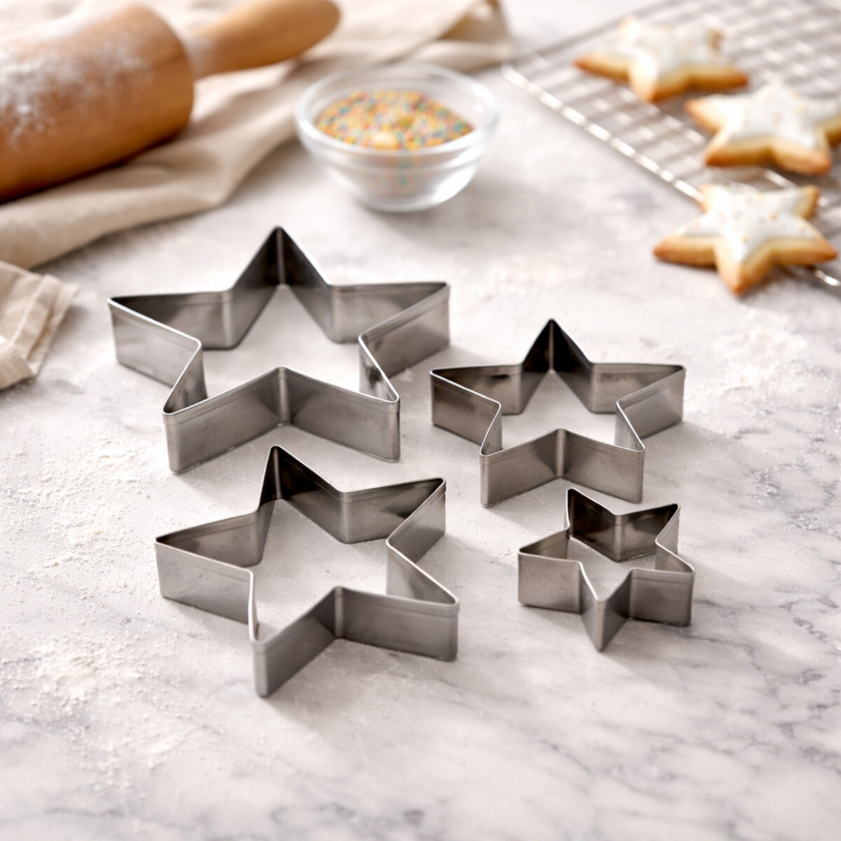 Set 4 moldes para galleta forma de estrella en metal - INOX 