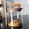 Contenedor de vidrio tapa y cuchara 600ml Contenedor de vidrio tapa y cuchara 600ml