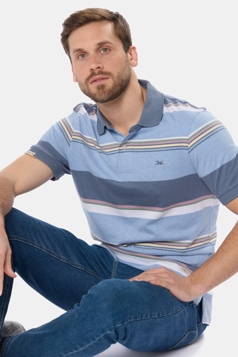REMERA POLO RAYADA JERSEY Celeste