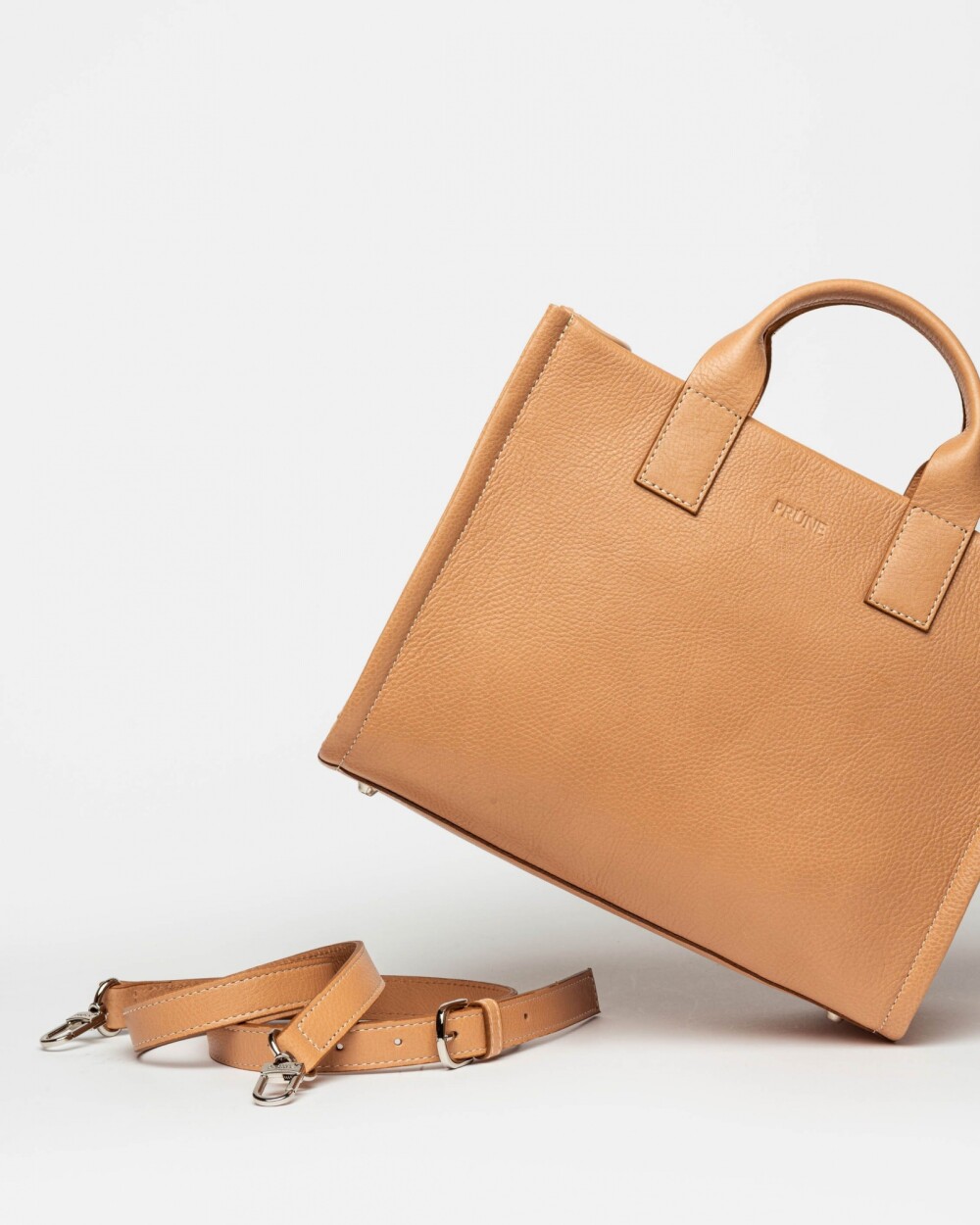 Cartera de mano Capri en cuero liso vegetal Vaqueta