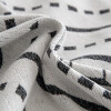 Manta sillon y cama punteada 180x300cm gris