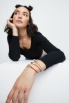PULSERA DE CUERO ROJO CON MOSQUETÓN ENTRELAZADO BAÑADO EN PLATA Pulsera