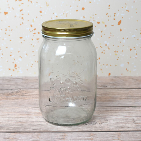 Frasco de vidrio labrado con tapa de metal Frasco de vidrio labrado con tapa de metal