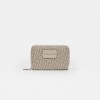 Billetera Monogram en efecto cuero Natural