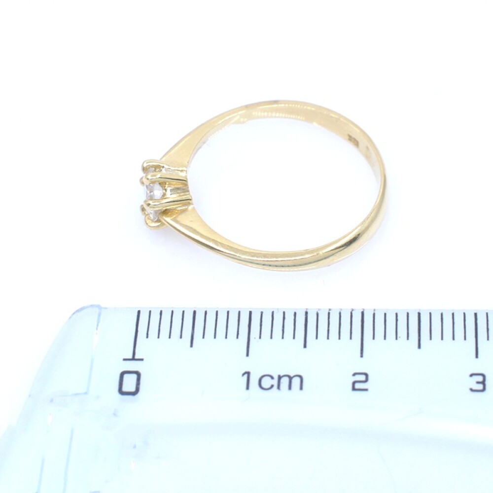 Anillo solitario en oro 18k y brillante Anillo solitario en oro 18k y brillante