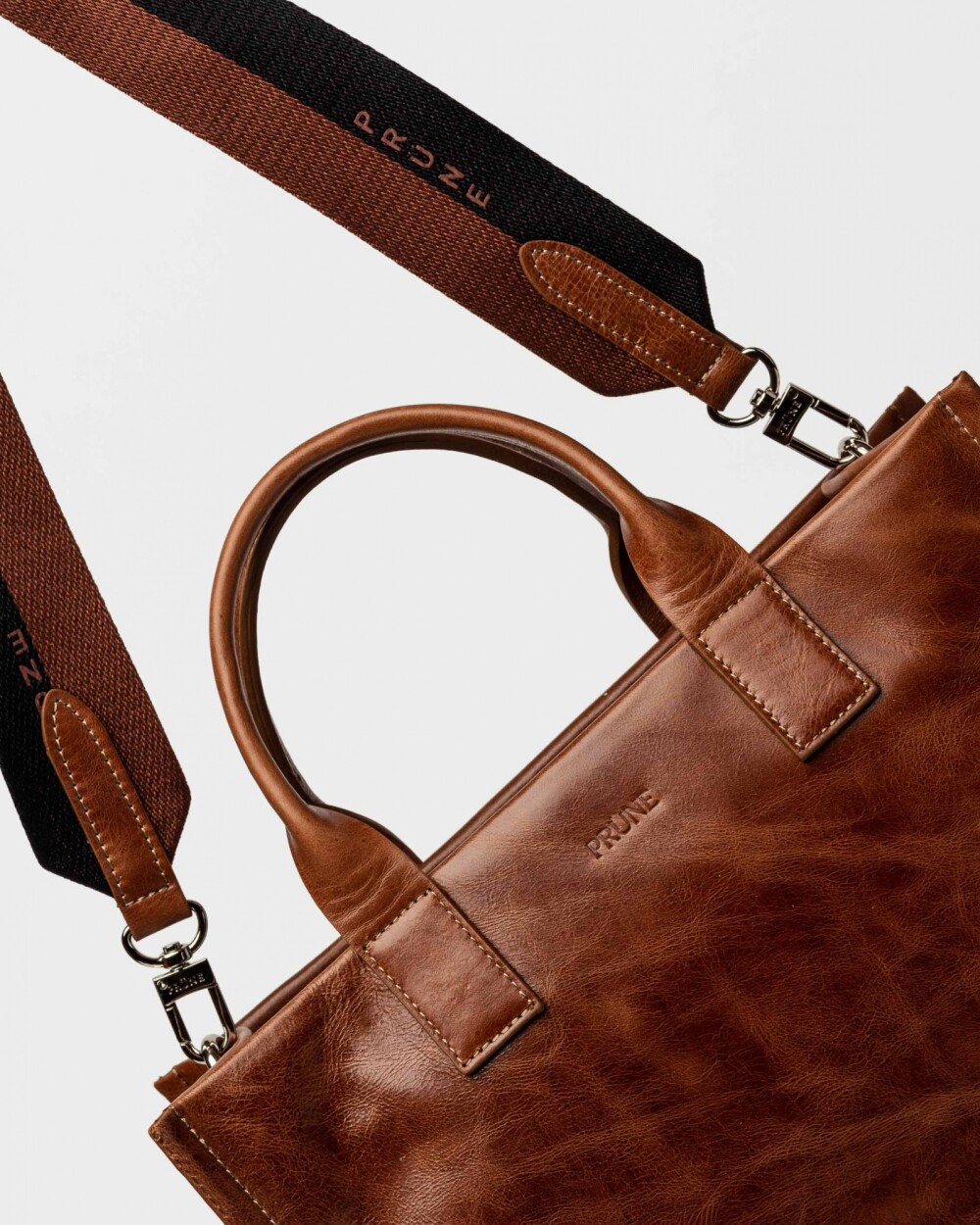 Cartera de Mano Capri En Cuero Liso Cuoio