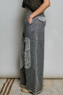 PANTALON CON PARCHE Negro