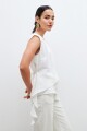 Blusa con volado crudo