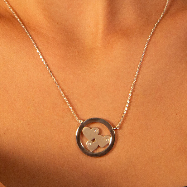 Colgante tres corazones de plata 925 con brillantes. Colgante tres corazones de plata 925 con brillantes.