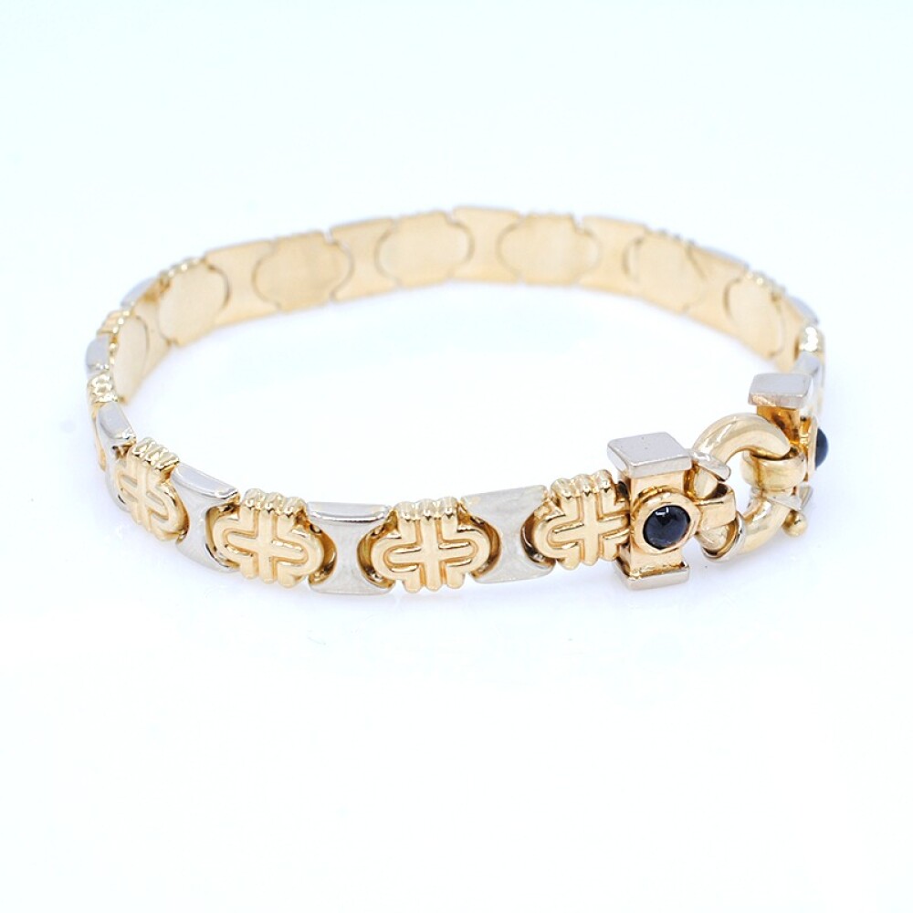 Pulsera en oro 18k combinada en 2 tonos con zafiros cabujón Pulsera en oro 18k combinada en 2 tonos con zafiros cabujón