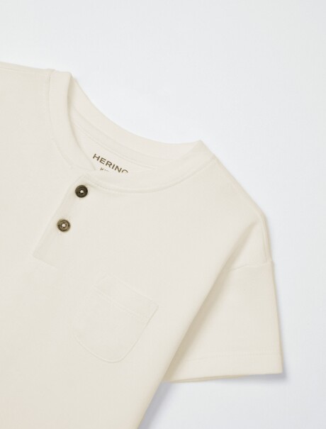 CAMISETA INFANTIL CON BOLSILLO Y BOTONES BEIGE