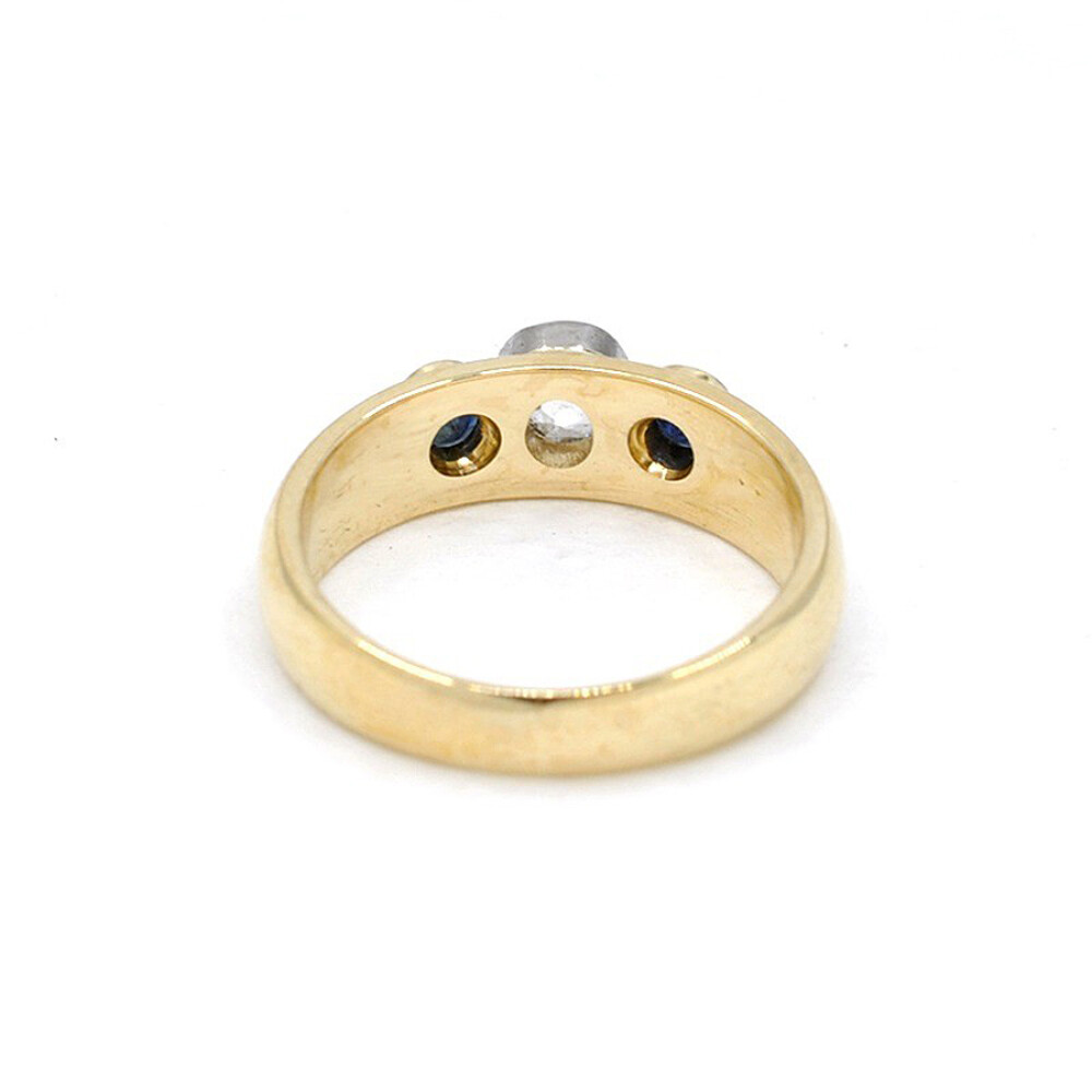 Anillo En Oro 18K Con Brillante Central Y 2 Zafiros Anillo En Oro 18K Con Brillante Central Y 2 Zafiros