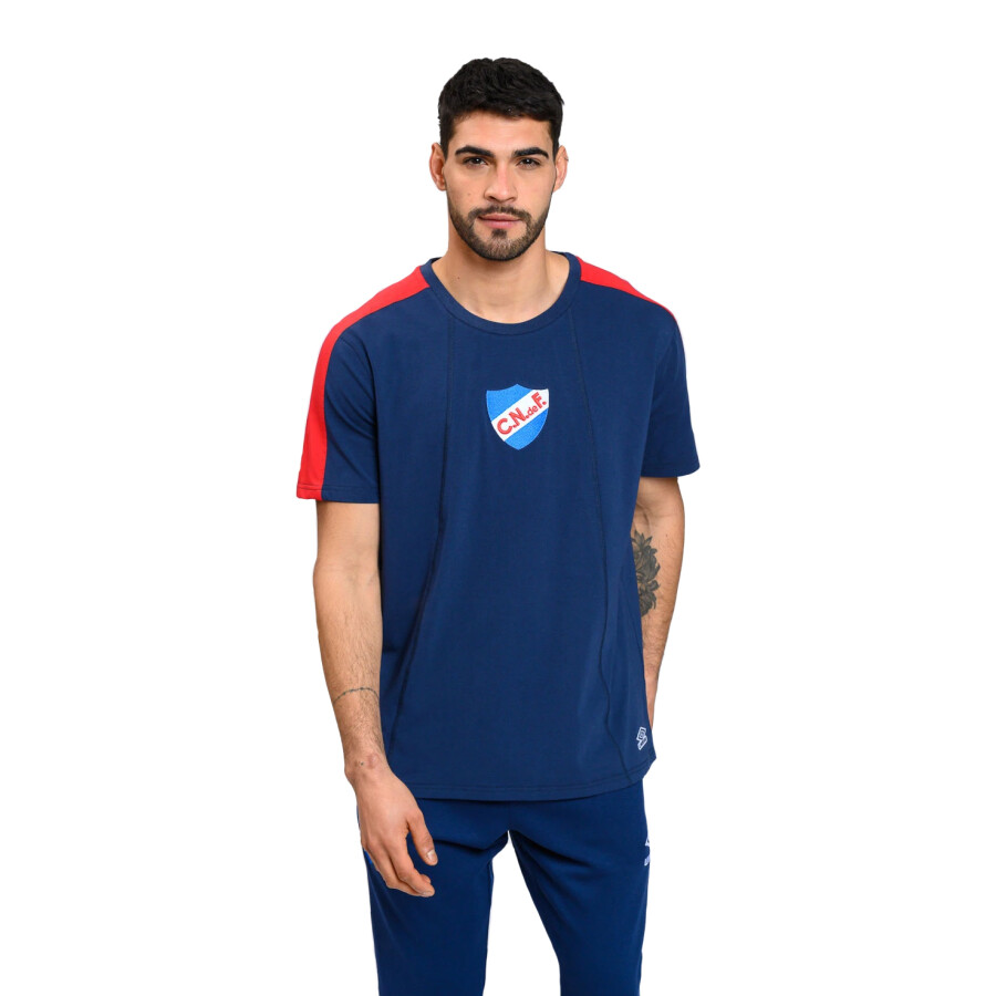 Remera de Hombre Umbro Nacional Hub Azul Marino - Rojo