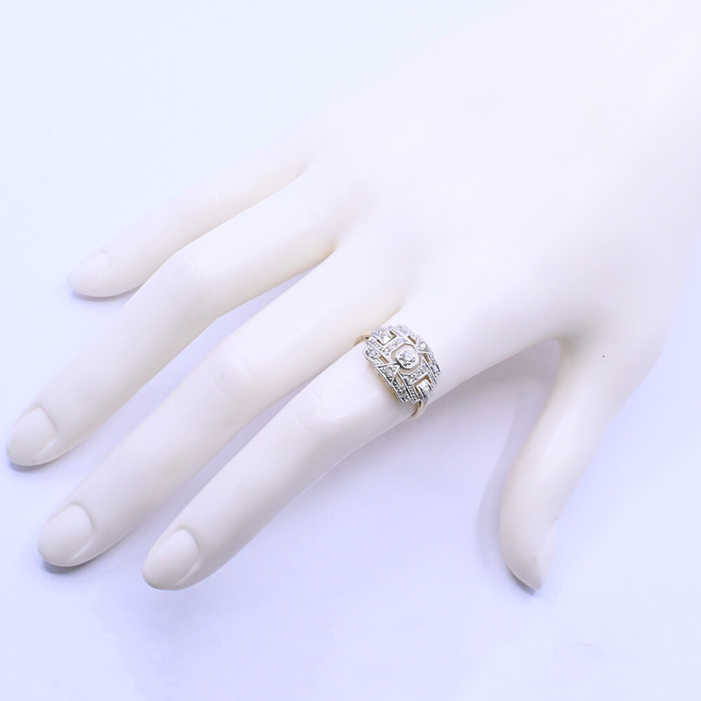 Anillo oro 18k antiguo con brillante y diamantes. Anillo oro 18k antiguo con brillante y diamantes.