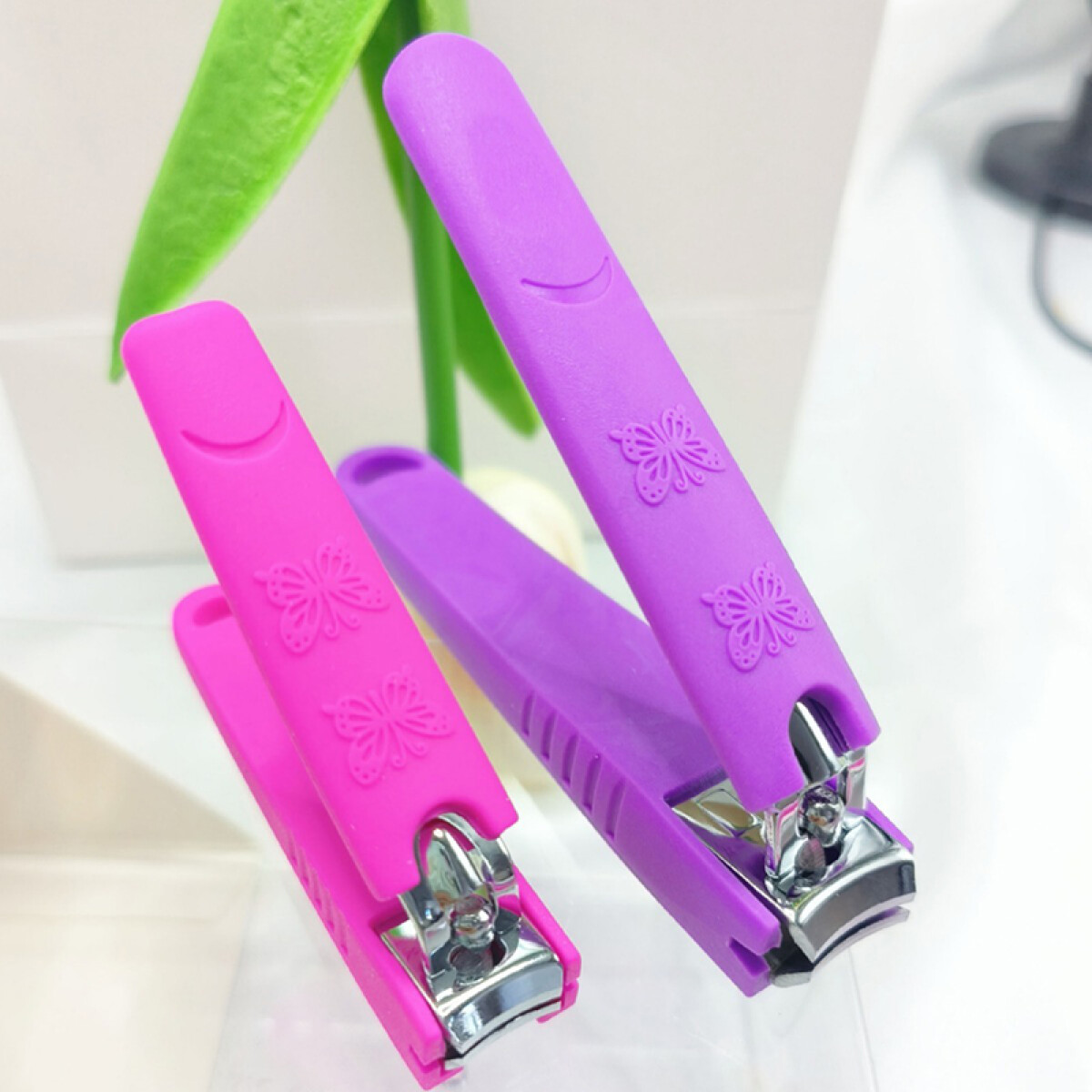 Pack x2 cortauñas - Color fucsia y violeta 