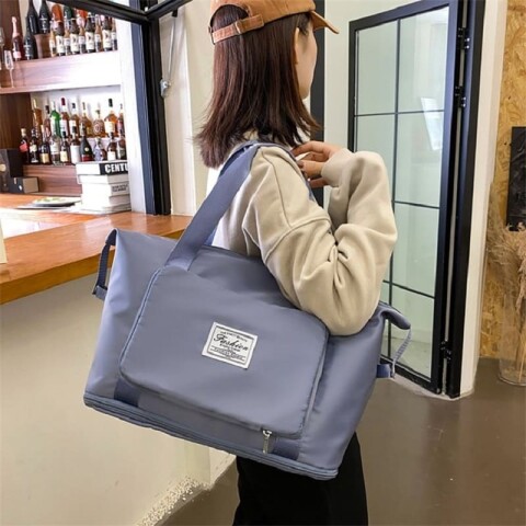 Bolso de viaje impermeable plegable y expandible azul