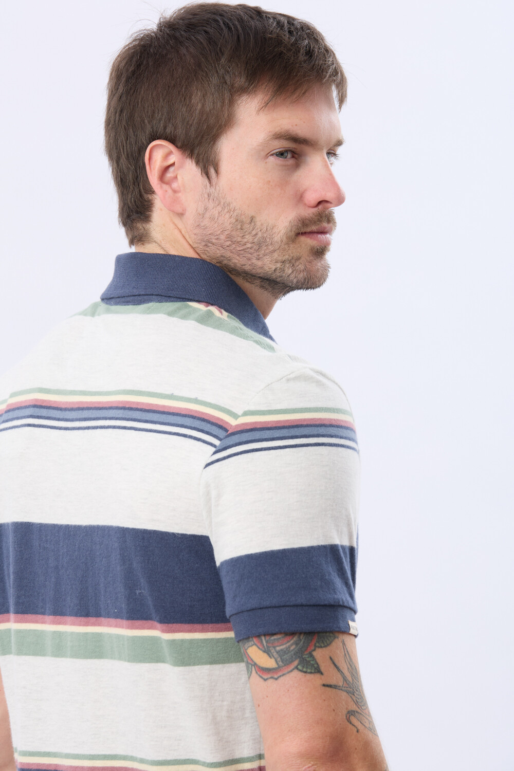 REMERA POLO RAYADA Gris