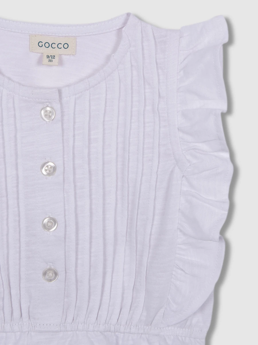 Camiseta Con Tablitas Y Volante Blanco