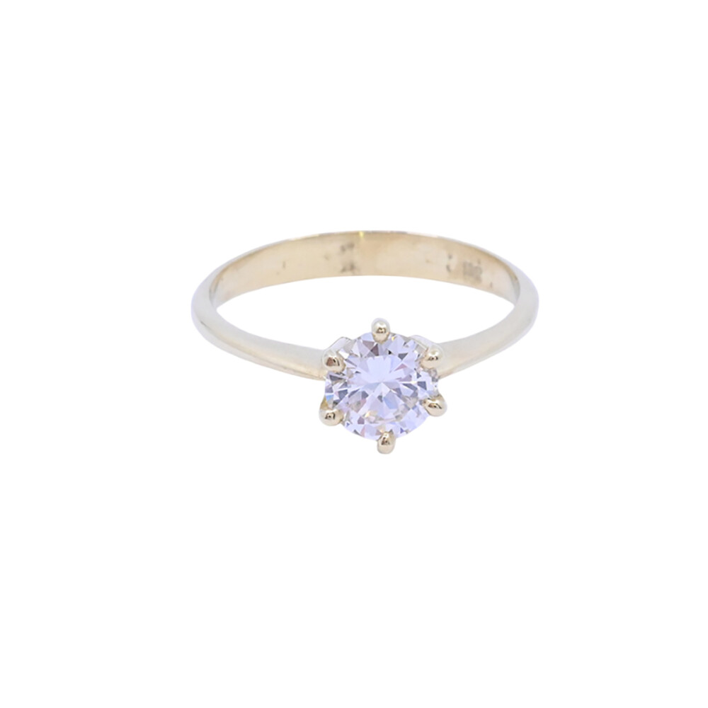Anillo solitario oro 18k y brillante engarce 6 puntas. Anillo solitario oro 18k y brillante engarce 6 puntas.