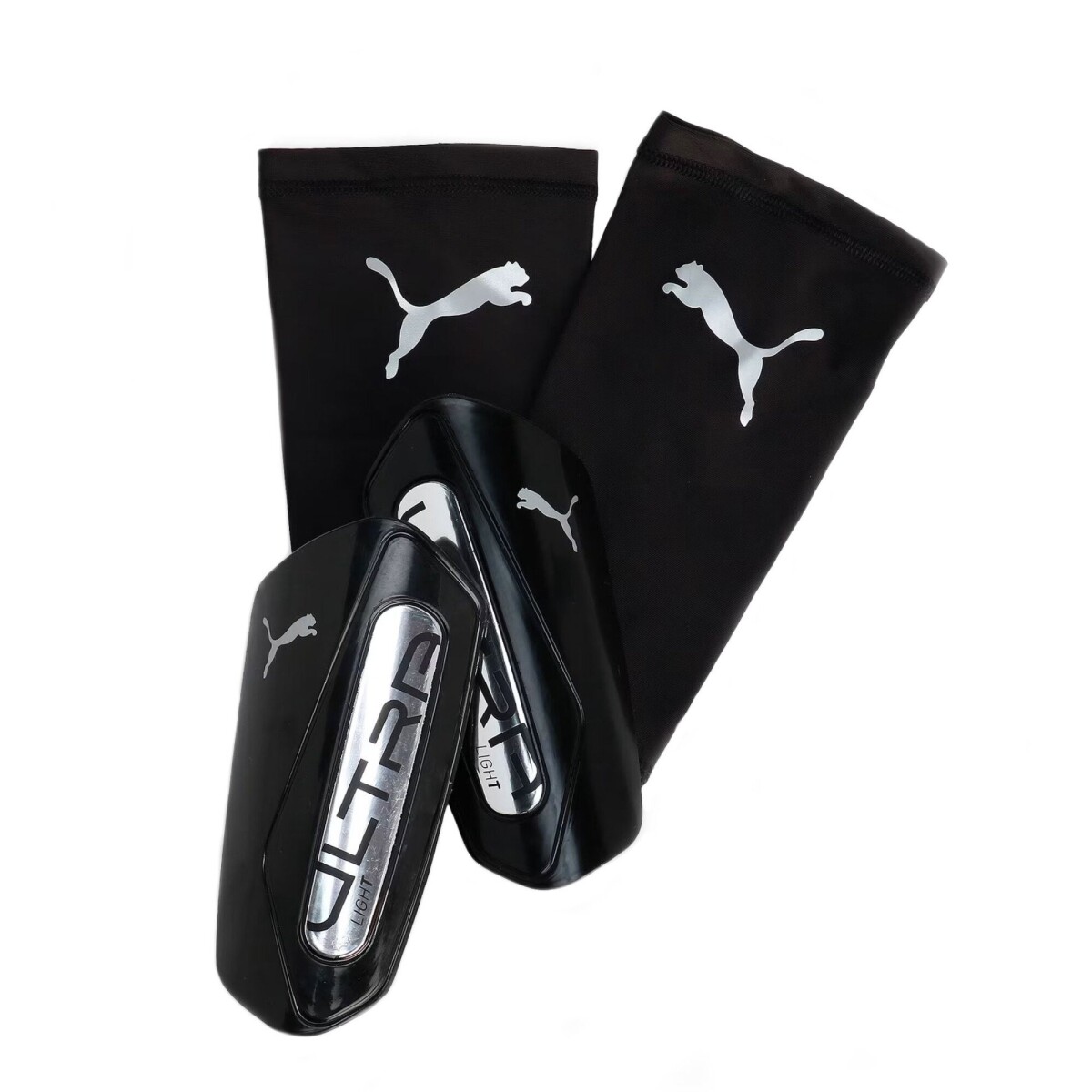 Canilleras Puma s Ultra c/malla Light Strap - Negro - Plateado 