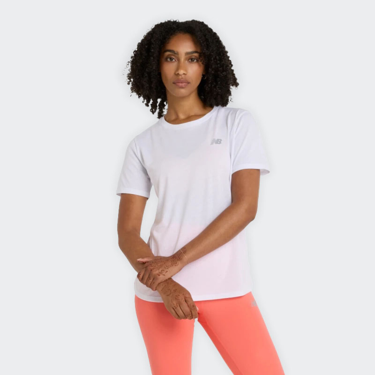 Remera New Balance Essentials Heathert - Blanco 