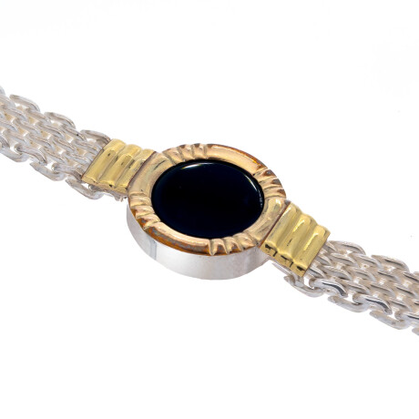 Pulsera de plata 925, double en oro 18 ktes y ónix. Pulsera de plata 925, double en oro 18 ktes y ónix.